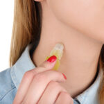young-woman-with-bottle-perfume-white-background-close-up (1)
